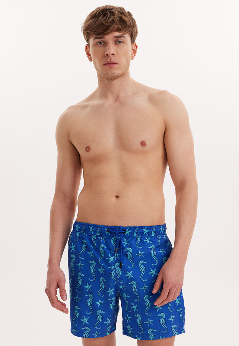 SEAHORSE ICON SWIM SHORTS in Blue AOP