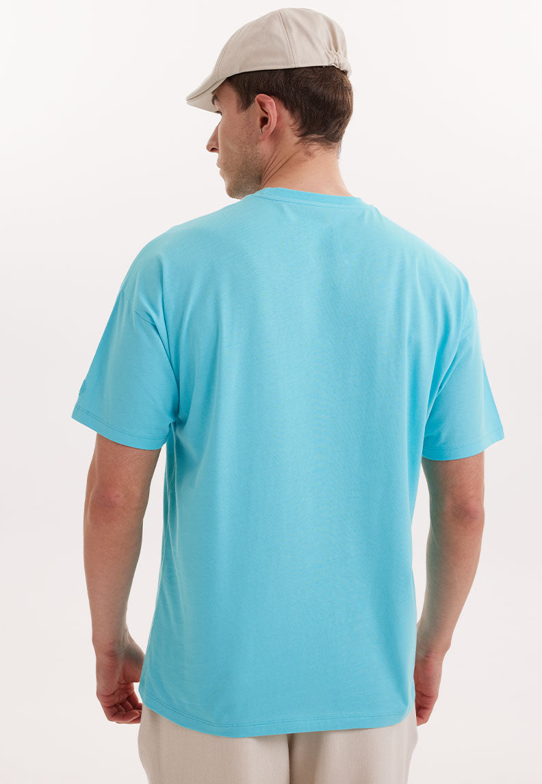 ESSENTIALS OVERSIZED TEE in Blue Curacao