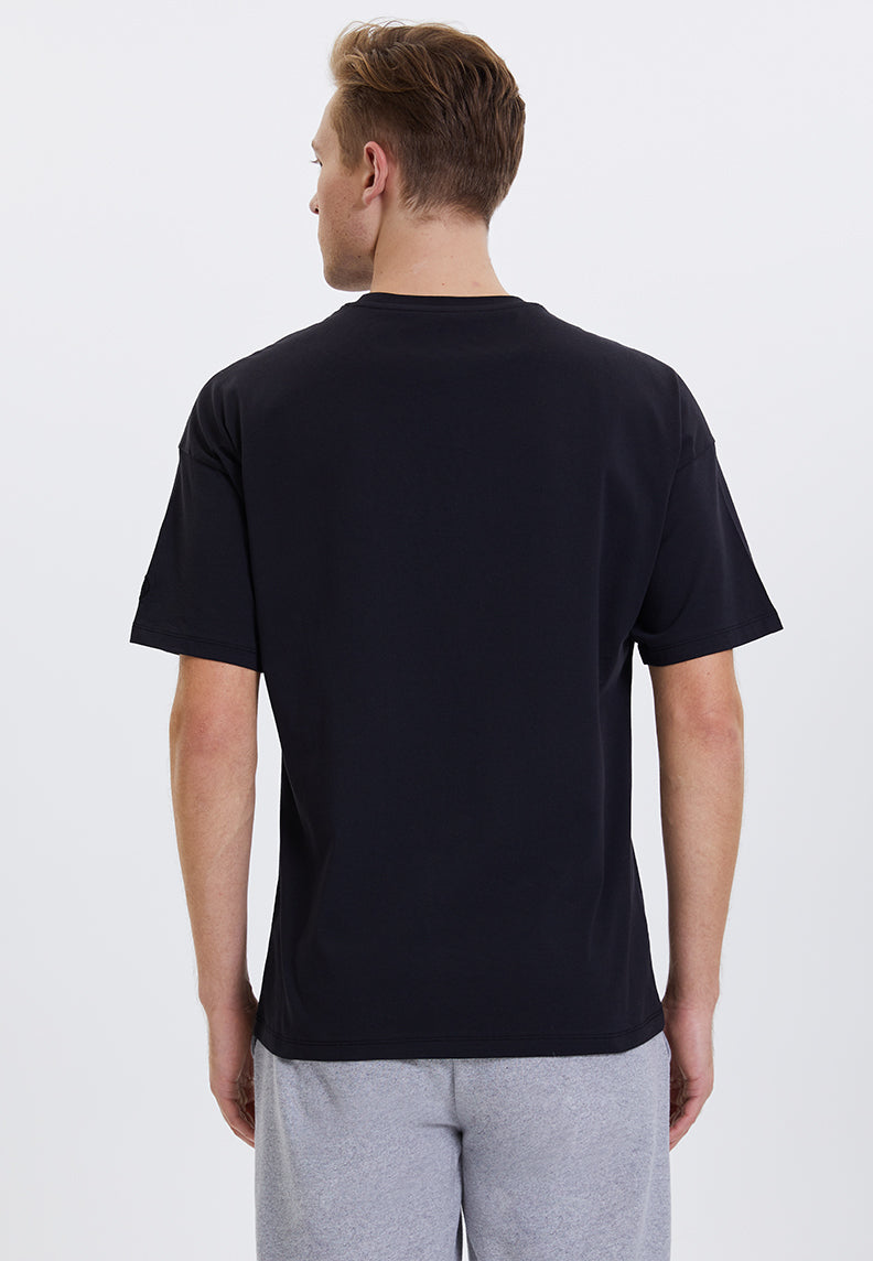 ESSENTIALS OVERSIZED TEE in Black