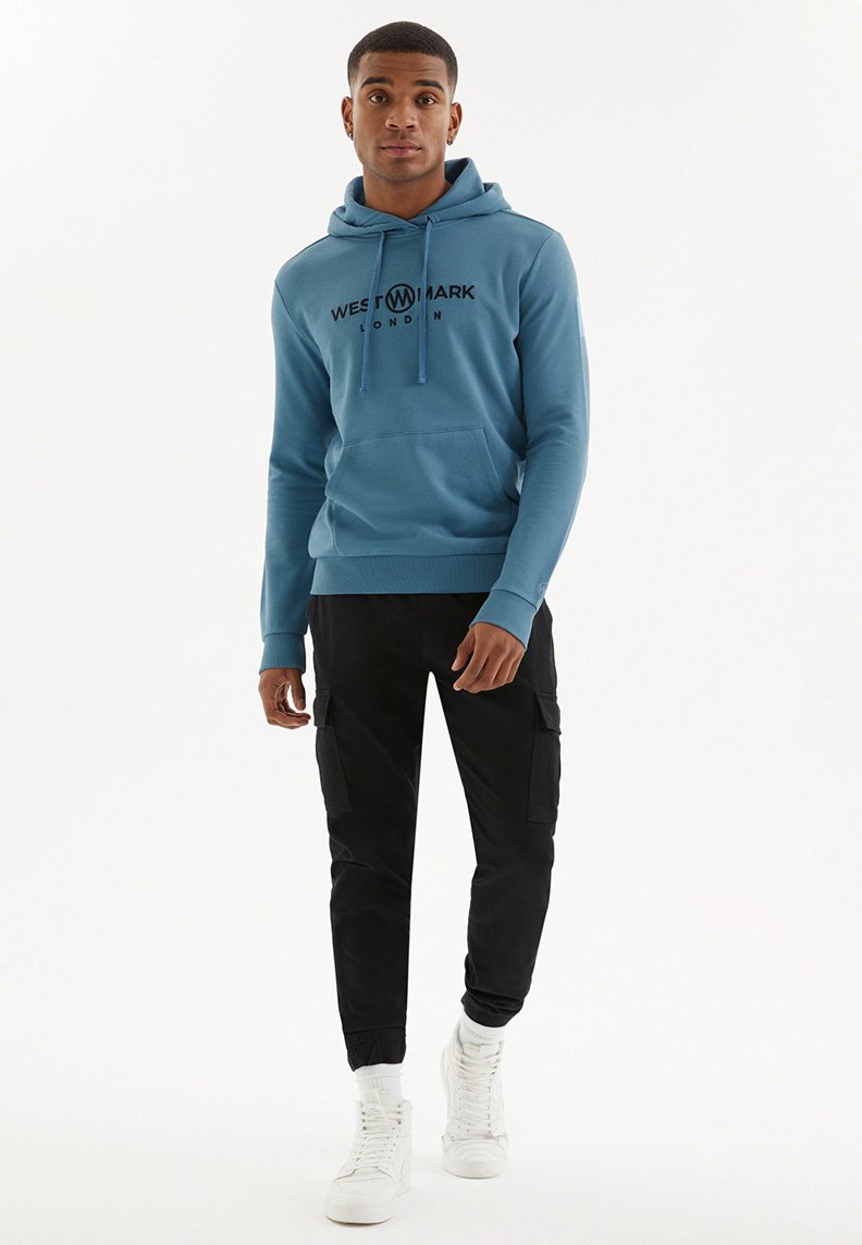 SIGNATURE HOODIE mit TASCHE in Ägäisblau