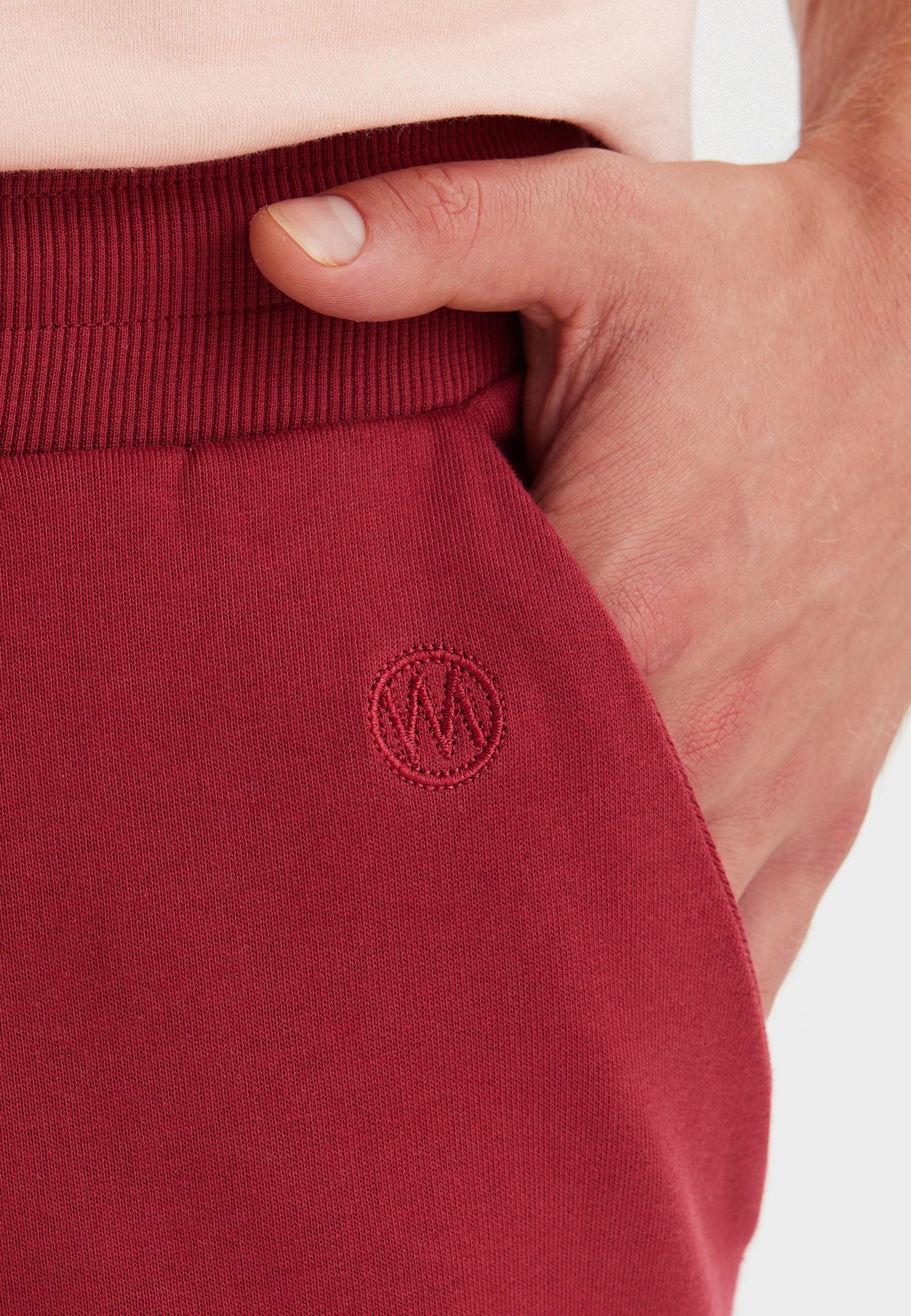 CORE SWEATPANTS in Mineral Red