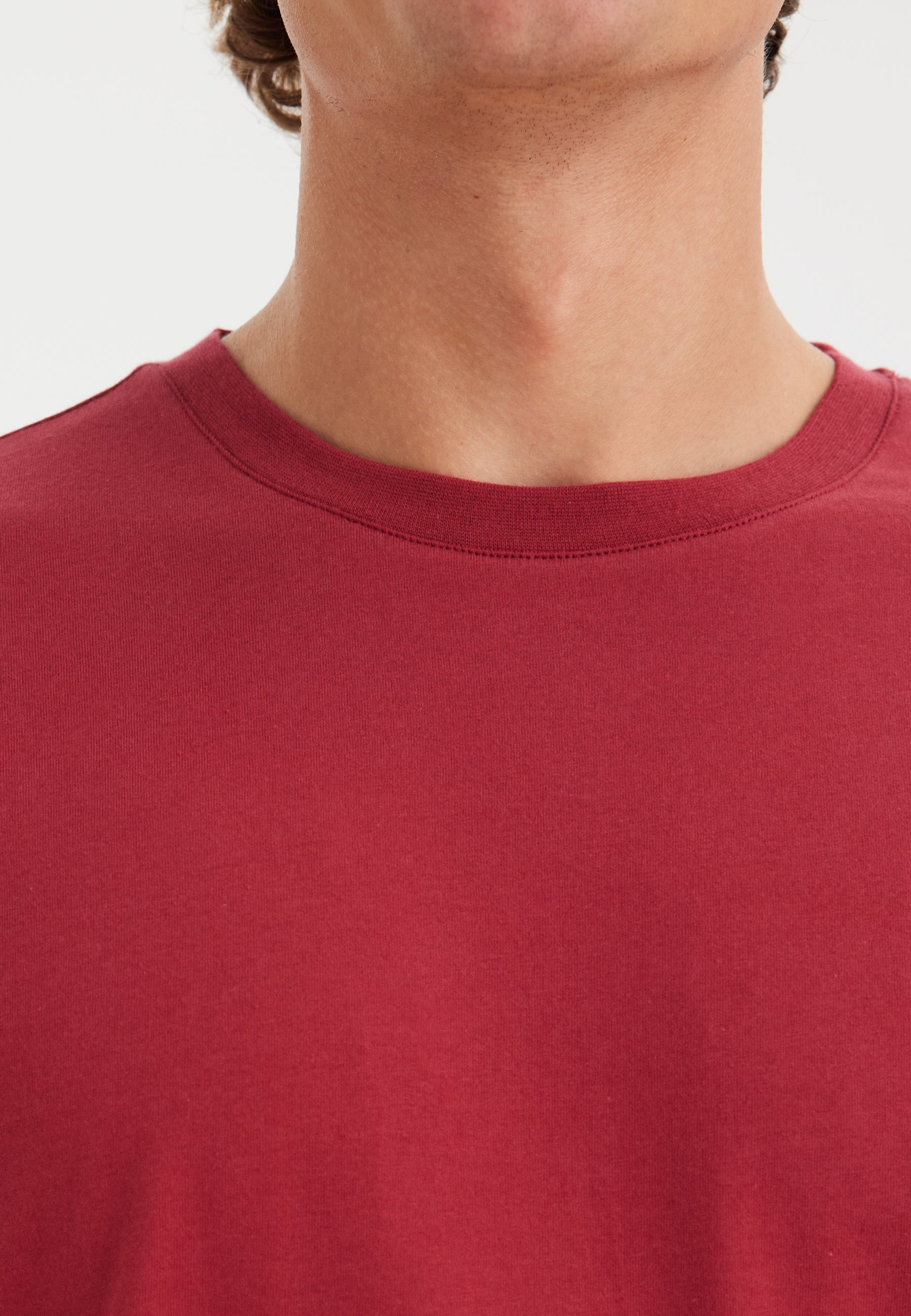ESSENTIALS OVERSIZED TEE in Mineral Red