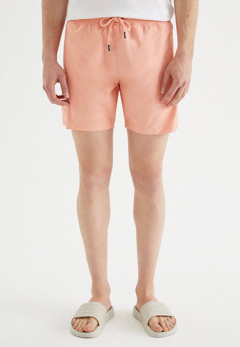 SOLID SWIM SHORTS in Coral Cloud