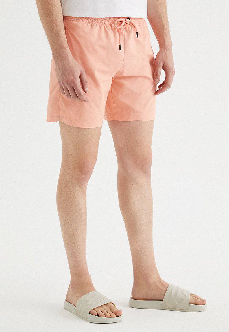 SOLID SWIM SHORTS in Coral Cloud