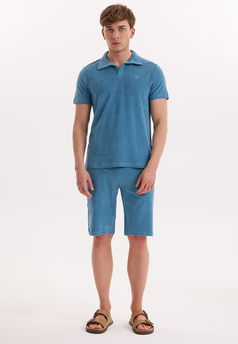 BREEZE TOWELLING POLO SHIRT in Aegean Blue