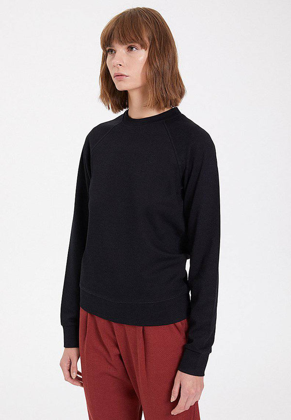 ESSENTIALS REGLAN SLEEVE SWEAT in Black