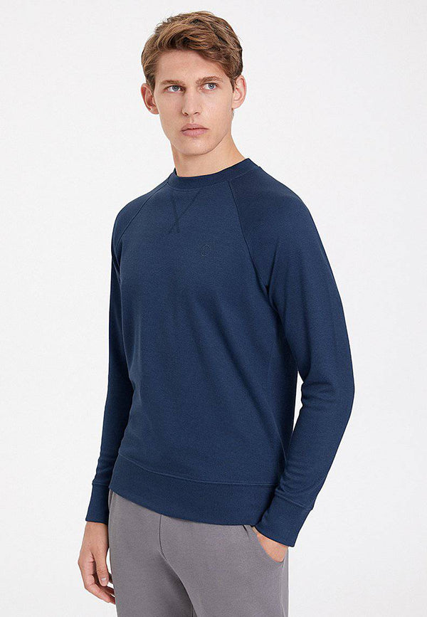 ESSENTIALS REGLAN SLEEVE SWEAT in Dress Blues
